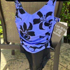 NWT, Miracle suit, size 8, purple and black one piece bathing suit